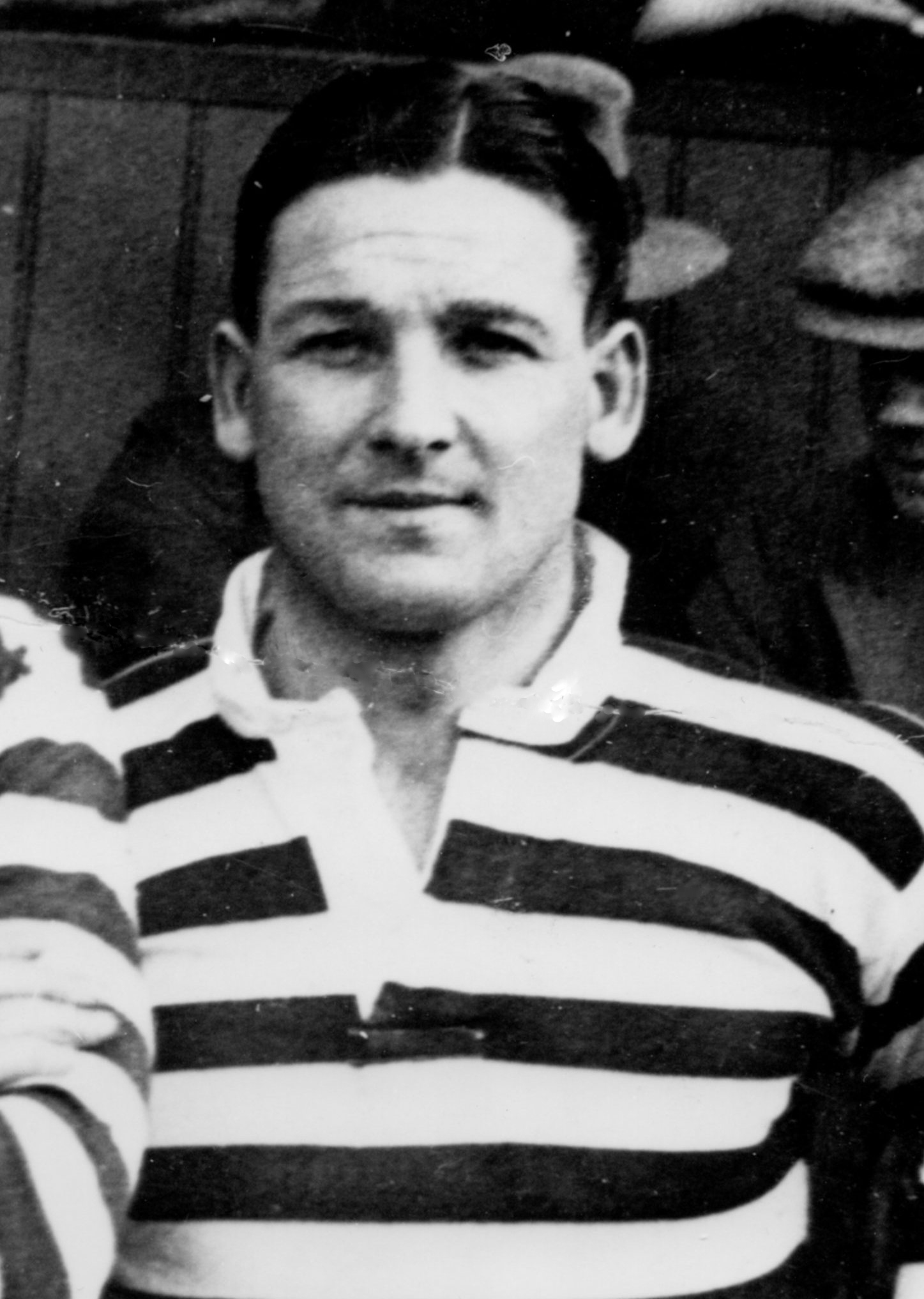 Portrait of an Oldham player in a hooped jersey